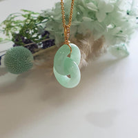 Translucent Light Apple Green Jadeite "Eternal Embrace" Pendant (JAB006384)
