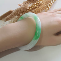 Translucent Brilliant Apple Green Jadeite Princess Round “Scenery” Bangle (JAC003360)