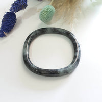 Translucent Greenish Black Jadeite “Art De Squarera” Princess Round Bangle (JAC003440)