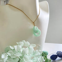Translucent Light Apple Green Jadeite "Eternal Embrace" Pendant (JAB006384)