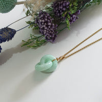 Translucent Light Apple Green Jadeite "Eternal Embrace" Pendant (JAB006384)